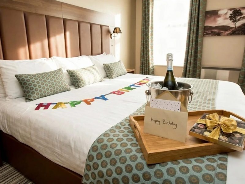 A,Bottle,Of,Prosecco,Is,Chilling,On,A,Wooden,Tray